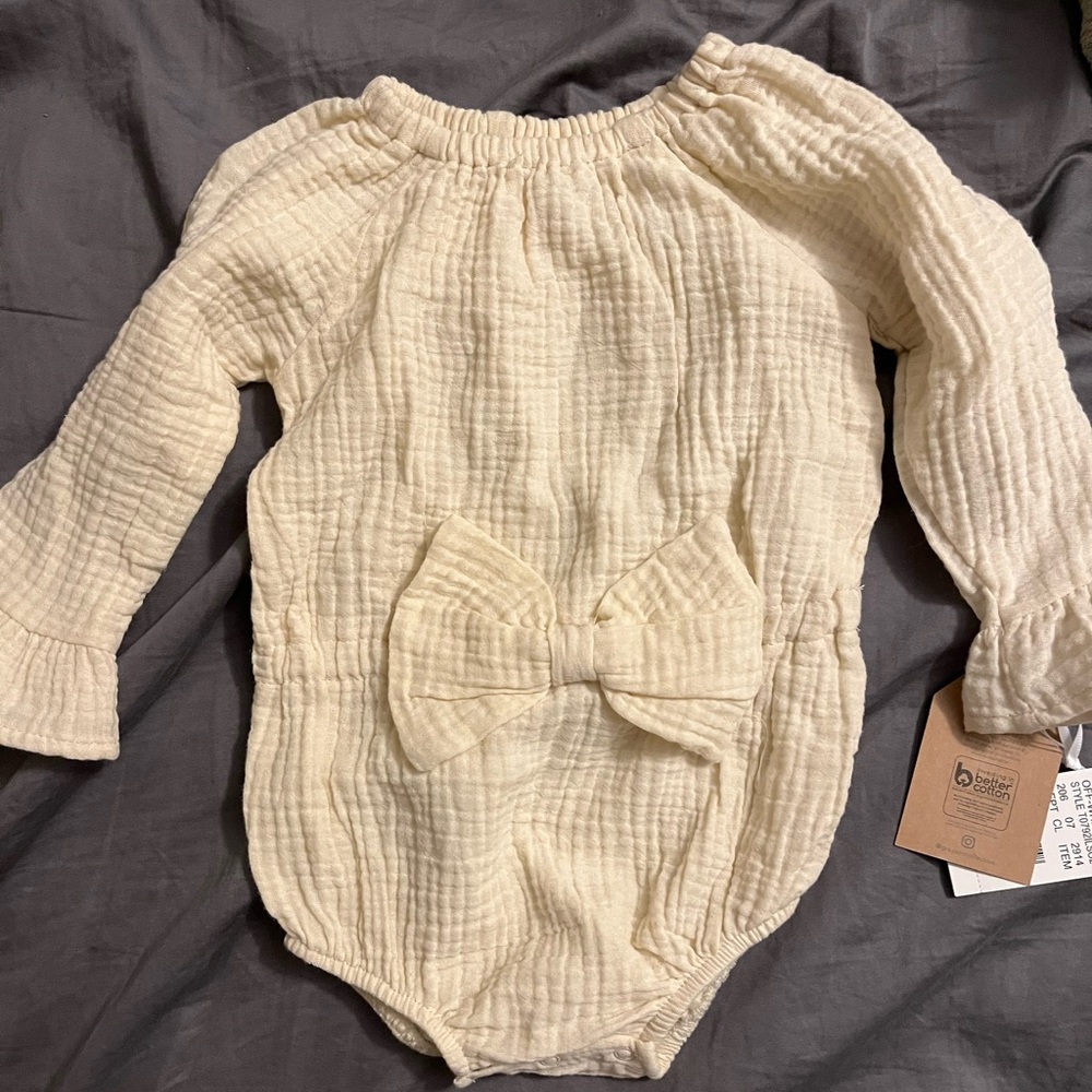 Brand new off white baby onsie